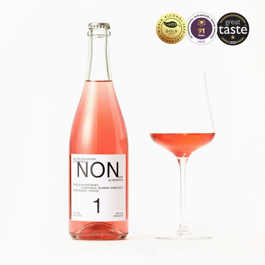 NON1 Salted Raspberry & Chamomile bottle beside a filled wine glass