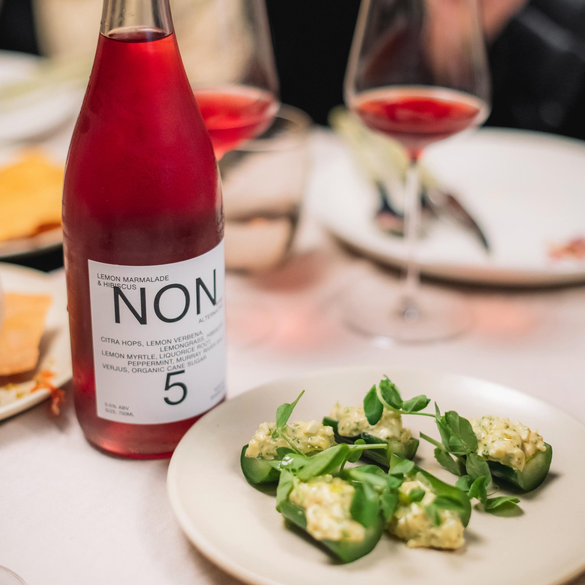 NON5 Lemon Marmalade & Hibiscus poured into a wine glass